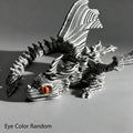 Articulated Black-and-White Swirl Dragon Figurine with Poseable Segments and Random Eye Color for Desktop Display — image 12
