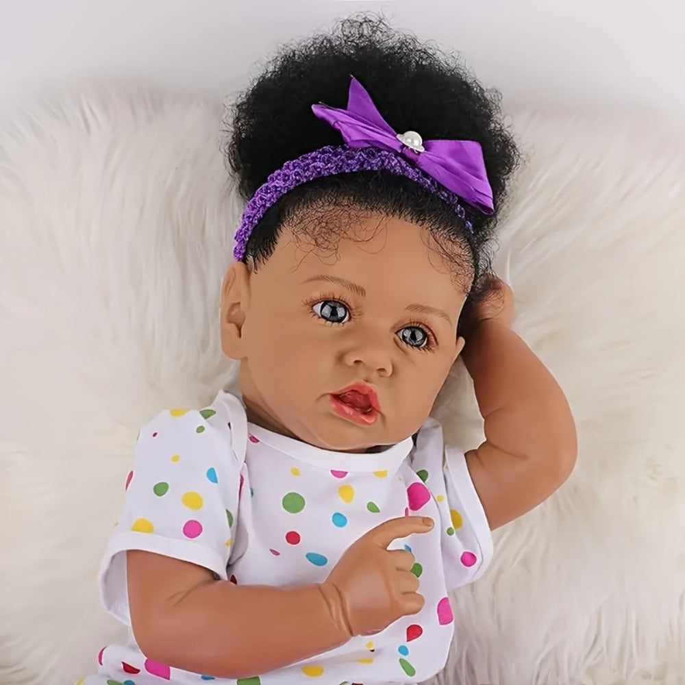 Reborn Baby Doll 21.5-Inch Full Vinyl Design with Curly Dark Hair, Open Eyes and Purple-and-White Outfit — image 5