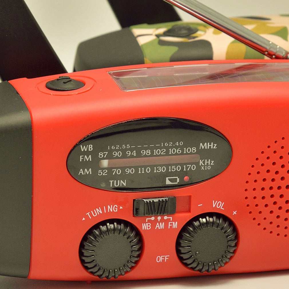 Solar hand crank USB charging radio flashlight