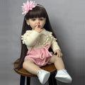 Reborn Baby Doll 22-Inch Full Vinyl Seated Design with Long Dark Wig Hair, Acrylic Eyes and Outfit Set — image 10