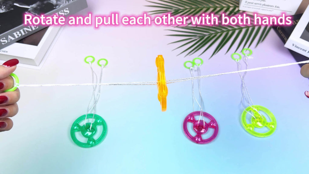 Thirty Pull-String Flywheel Spinner Toys with Four Assorted Colors and Pictured 7cm Wheel Diameter — image 6