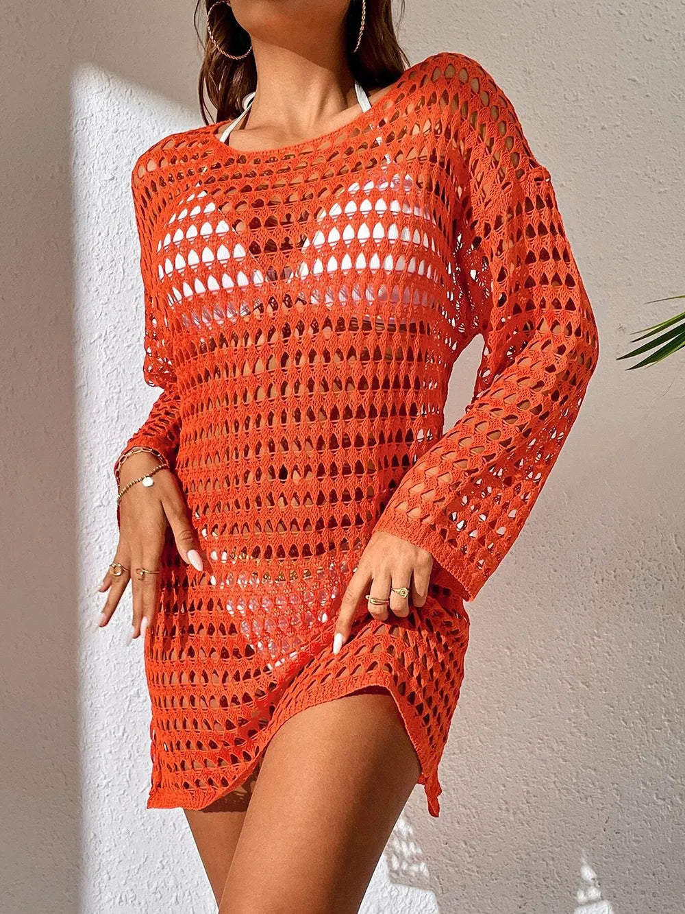 Knitted hollowed out pullover round neck long sleeved bikini swimsuit cover