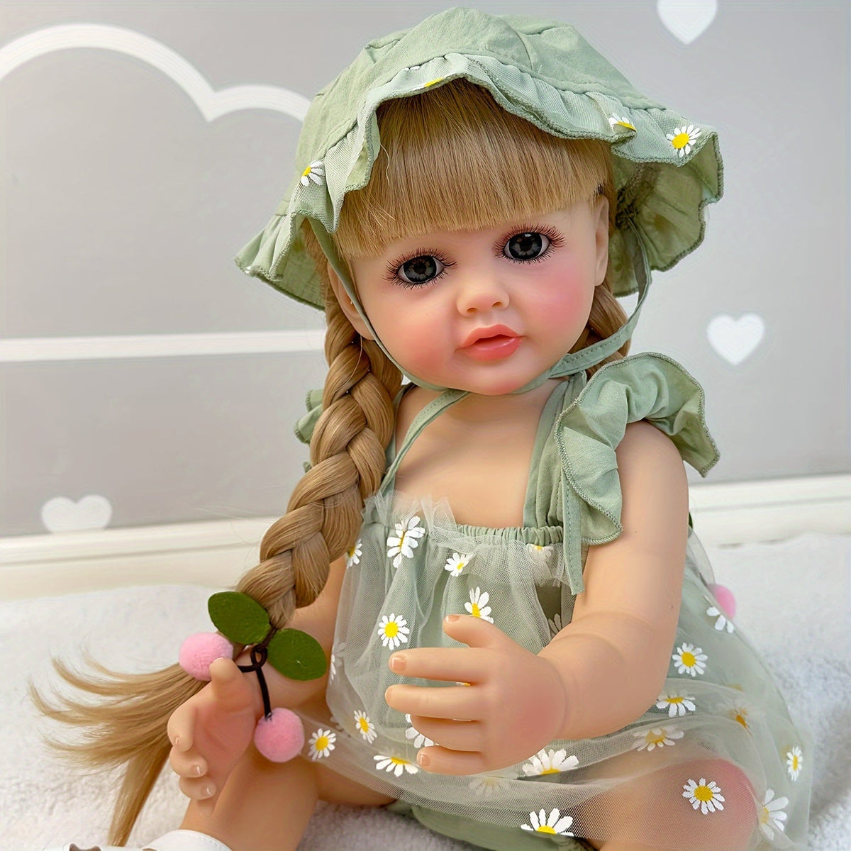 Reborn Baby Doll 22-Inch Full Vinyl Design with Long Blonde Hair, Open Eyes, Green Outfit and Accessories — image 1