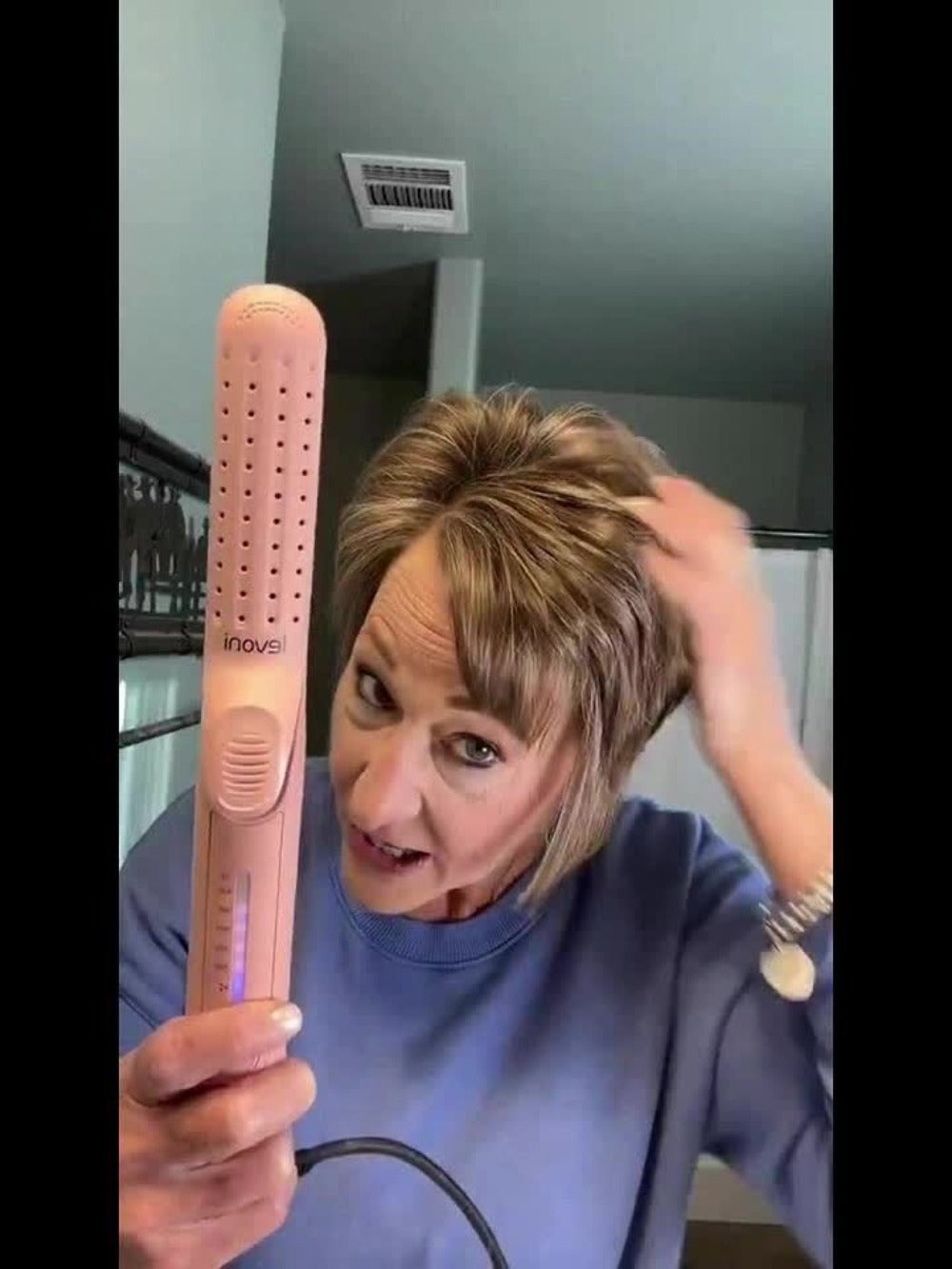 Two-in-One Airflow Hair Styler with Curved Plates, Five Temperature Settings and Pink or Black Finish — image 12