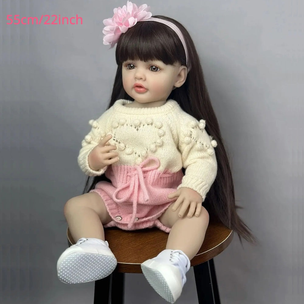Reborn Baby Doll 22-Inch Full Vinyl Seated Design with Long Dark Wig Hair, Acrylic Eyes and Outfit Set — image 7
