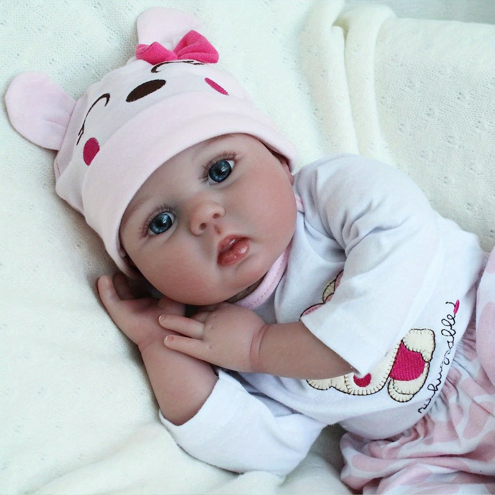Reborn Doll 22-Inch Cloth-Body Sleeping Figure with Vinyl Head and Limbs, Character-Print Outfit and Accessories — image 7