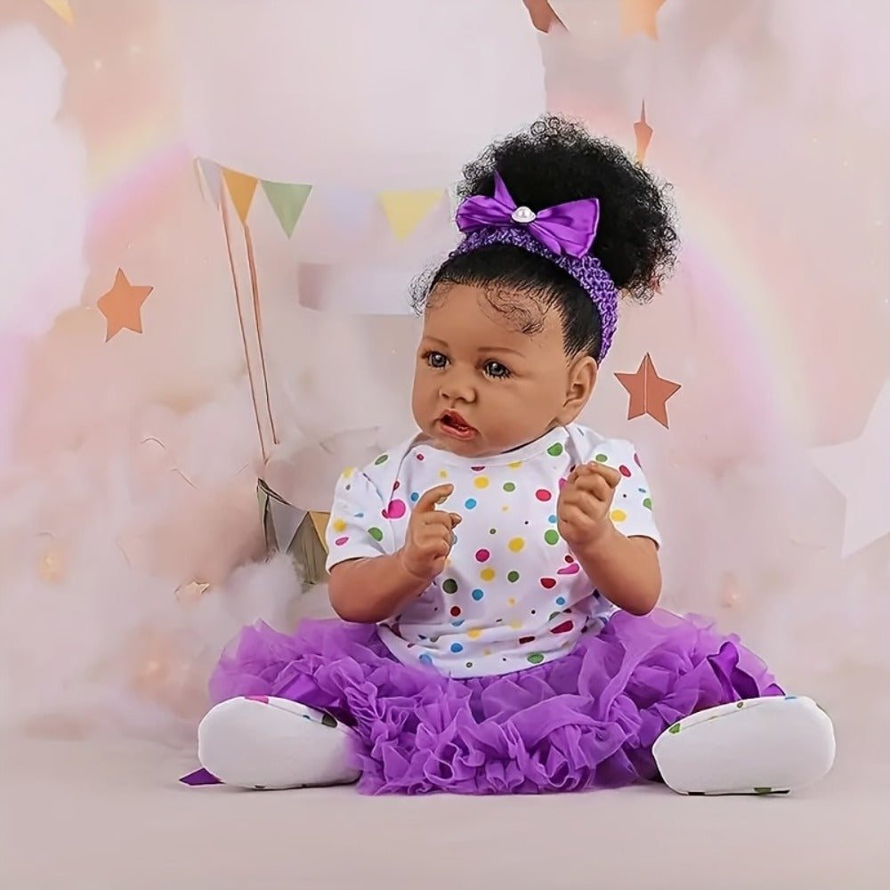 Reborn Baby Doll 21.5-Inch Full Vinyl Design with Curly Dark Hair, Open Eyes and Purple-and-White Outfit — image 3