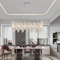 Silver elegant oval crystal pendant light, modern ceiling fixture with reflective suspended crystal (bulb not included) - V.I.P Digital Presence