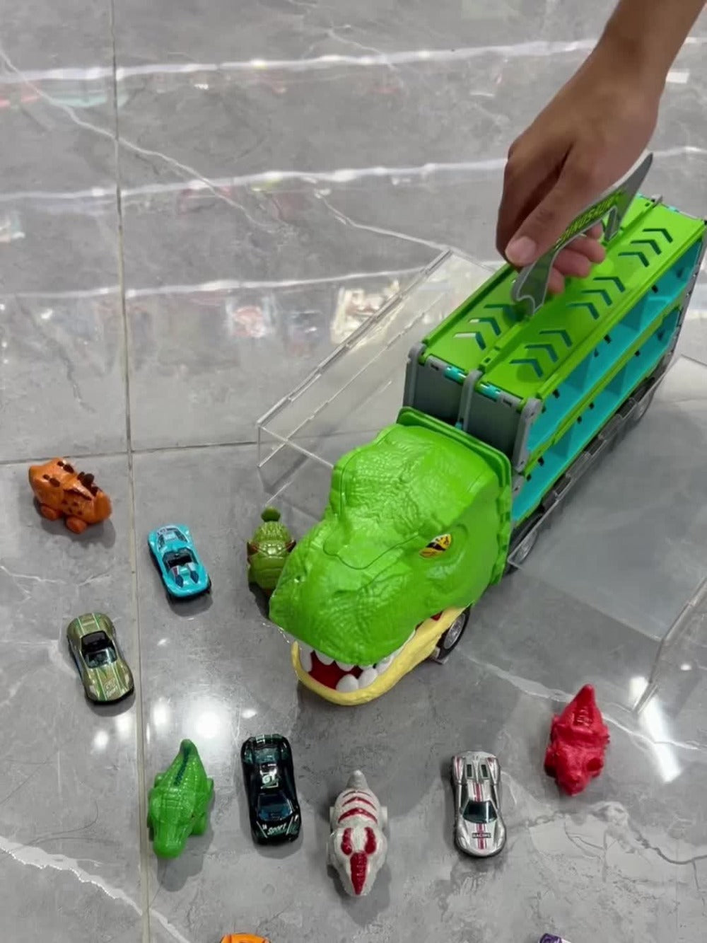 Dinosaur Truck Toys 13-in-1 Transport Carrier with 63-Inch Foldable Race Track, 6 Dino Cars + 6 Die-Cast Cars — image 11