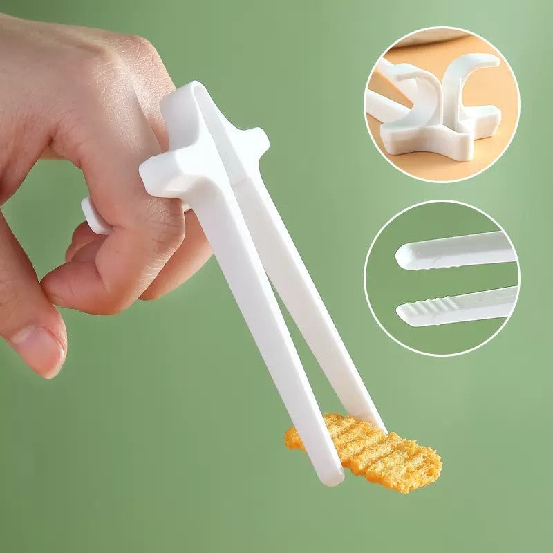 Playing games with fingers chopsticks snacking clips not dirty hands chopsticks finger loops