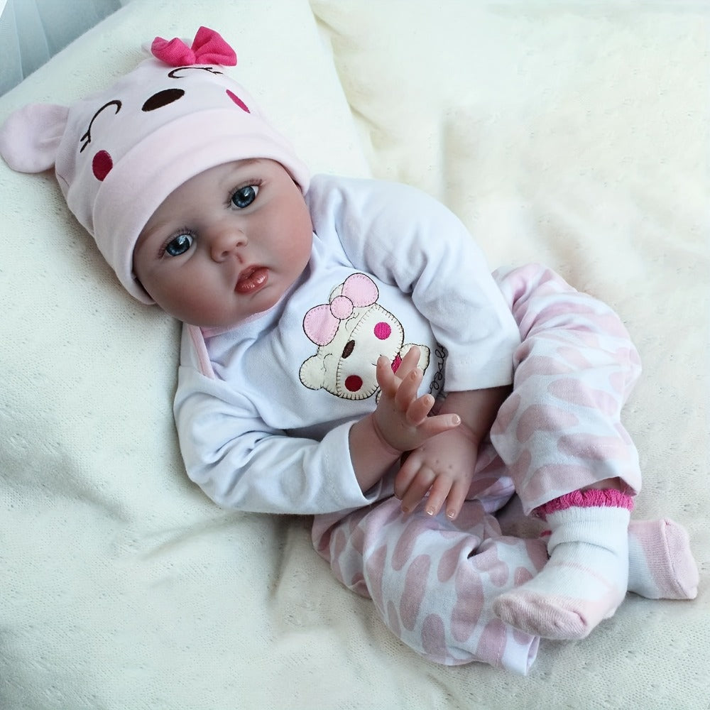 Reborn Doll 22-Inch Cloth-Body Sleeping Figure with Vinyl Head and Limbs, Character-Print Outfit and Accessories — image 1