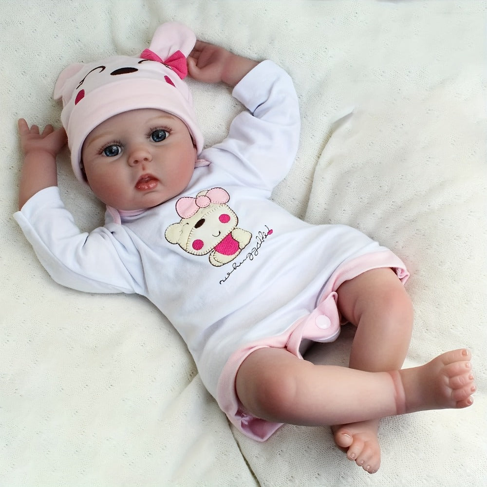 Reborn Doll 22-Inch Cloth-Body Sleeping Figure with Vinyl Head and Limbs, Character-Print Outfit and Accessories — image 4