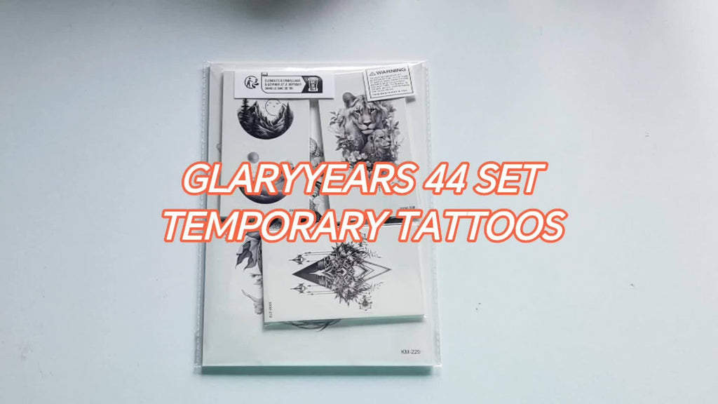 Temporary Tattoos, 44-Sheet Black Animal and Mountain Set with Wolf, Lion and Tiger Designs in Large and Small Sizes — image 