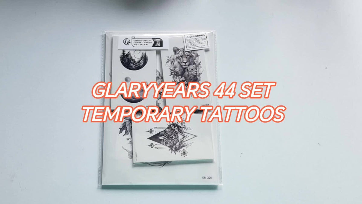 Temporary Tattoos, 44-Sheet Black Animal and Mountain Set with Wolf, Lion and Tiger Designs in Large and Small Sizes — image 
