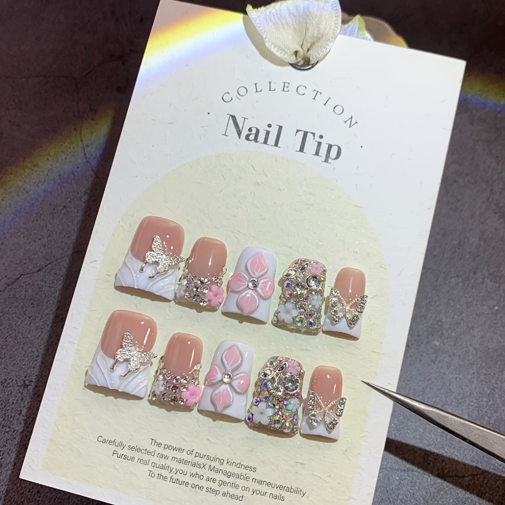 Press On Nails 10-Piece Short Duckbill Set with White French Tips, Golden Butterfly and 3D Carved Flower — image 1