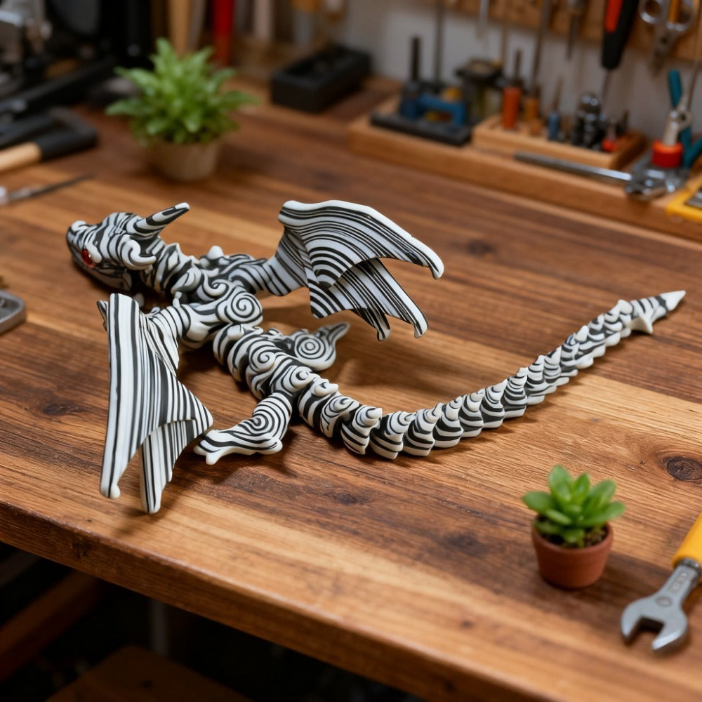 Articulated Black-and-White Swirl Dragon Figurine with Poseable Segments and Random Eye Color for Desktop Display — image 9