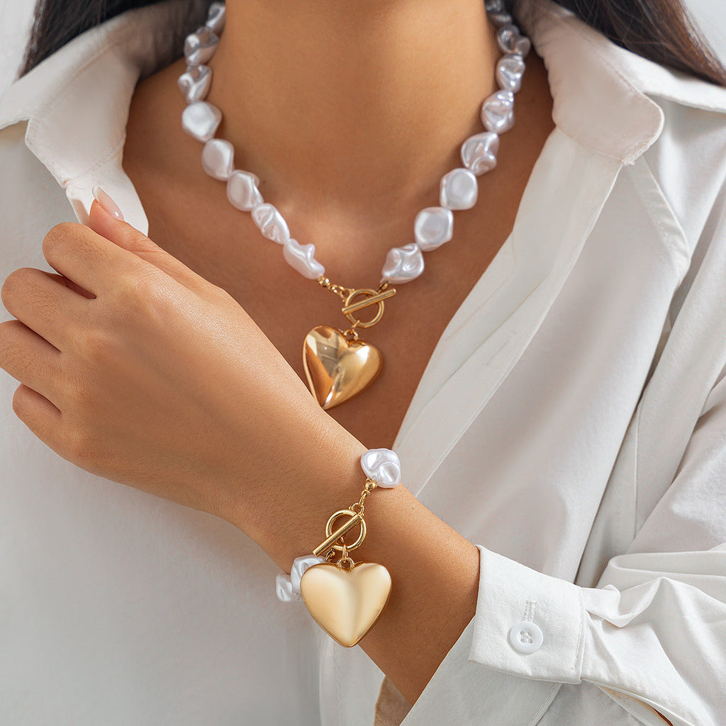 Fashionable heart-shaped hollow pendant collarbone chain simple flat bead pearl necklace set