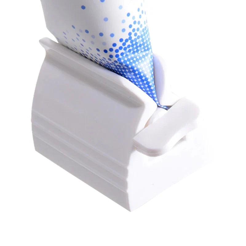 New Bathroom Accessories Toothpaste Squeezer Tooth Paste Dispenser Tube Squeezer Facial Cleanser Press Rolling Holder for Kids
