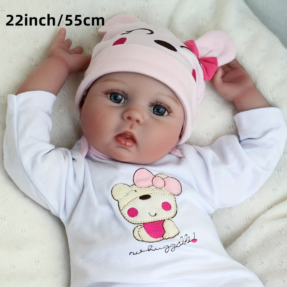 Reborn Doll 22-Inch Cloth-Body Sleeping Figure with Vinyl Head and Limbs, Character-Print Outfit and Accessories — image 2