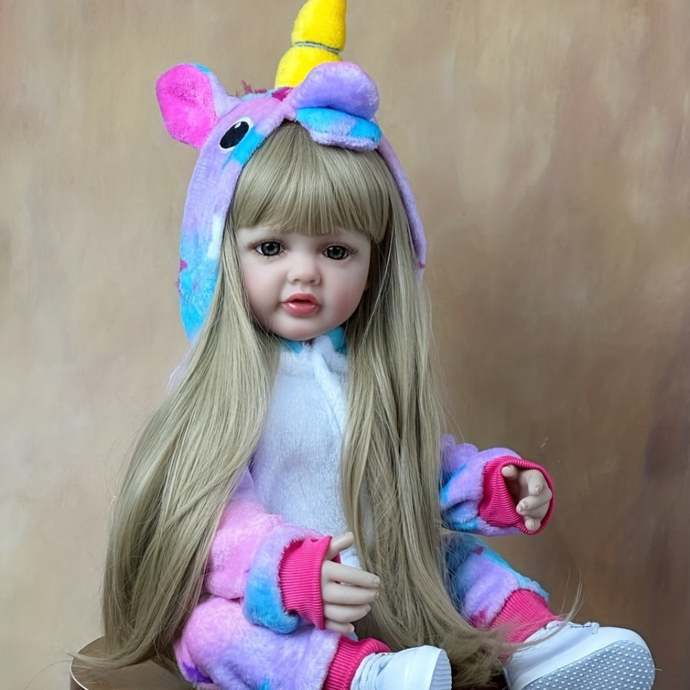 Reborn Baby Doll 22-Inch Soft Vinyl Toddler Design with Blonde Wig Hair, Acrylic Eyes and Unicorn Outfit — image 1