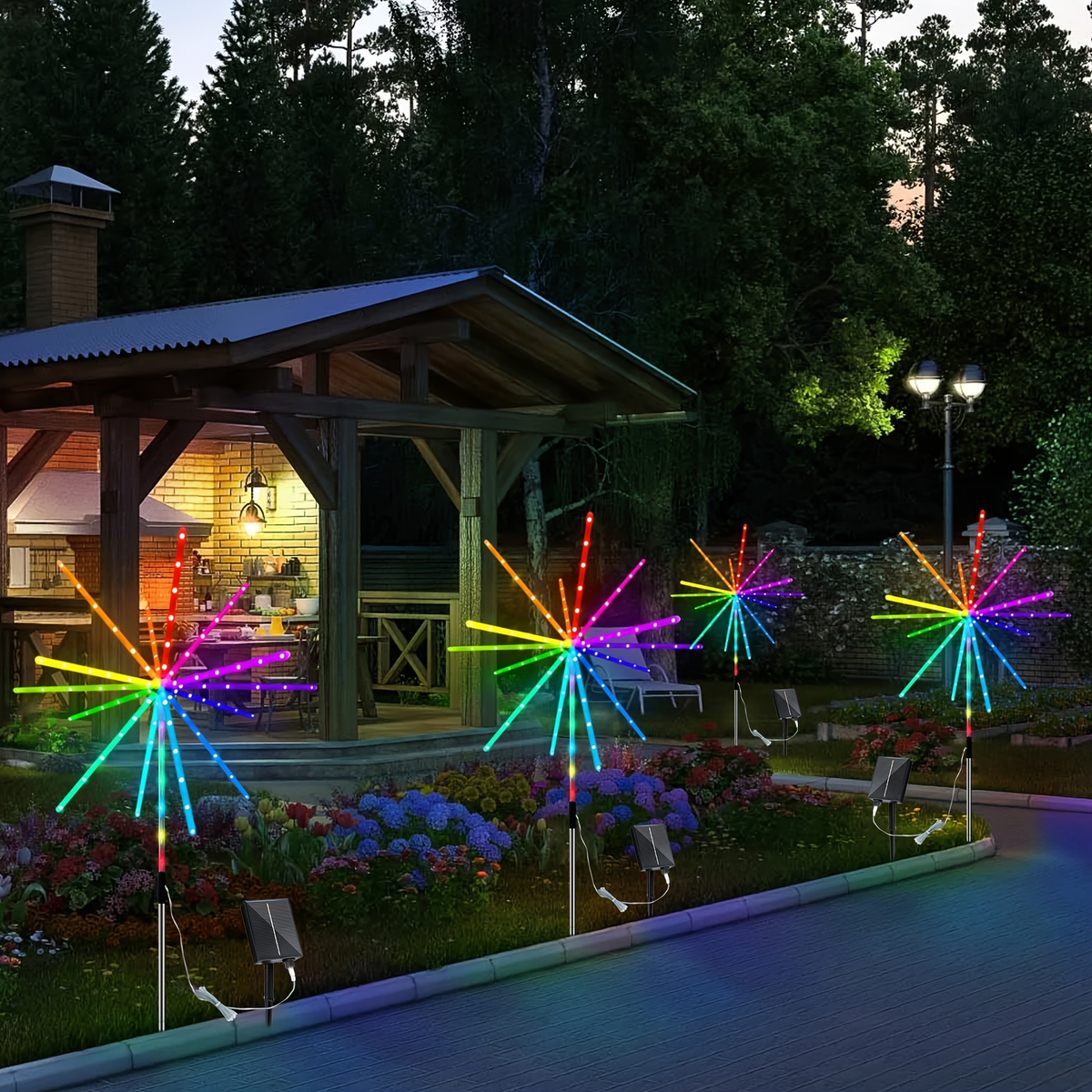Solar Outdoor Lights 4-Pack 336-LED 3D Meteor Stakes with Remote, Multicolor Output and IP65 Rating — image 1