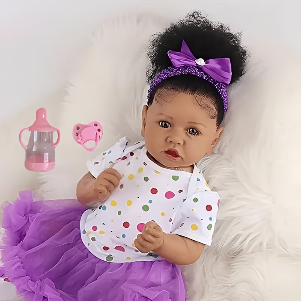 Reborn Baby Doll 21.5-Inch Full Vinyl Design with Curly Dark Hair, Open Eyes and Purple-and-White Outfit — image 1