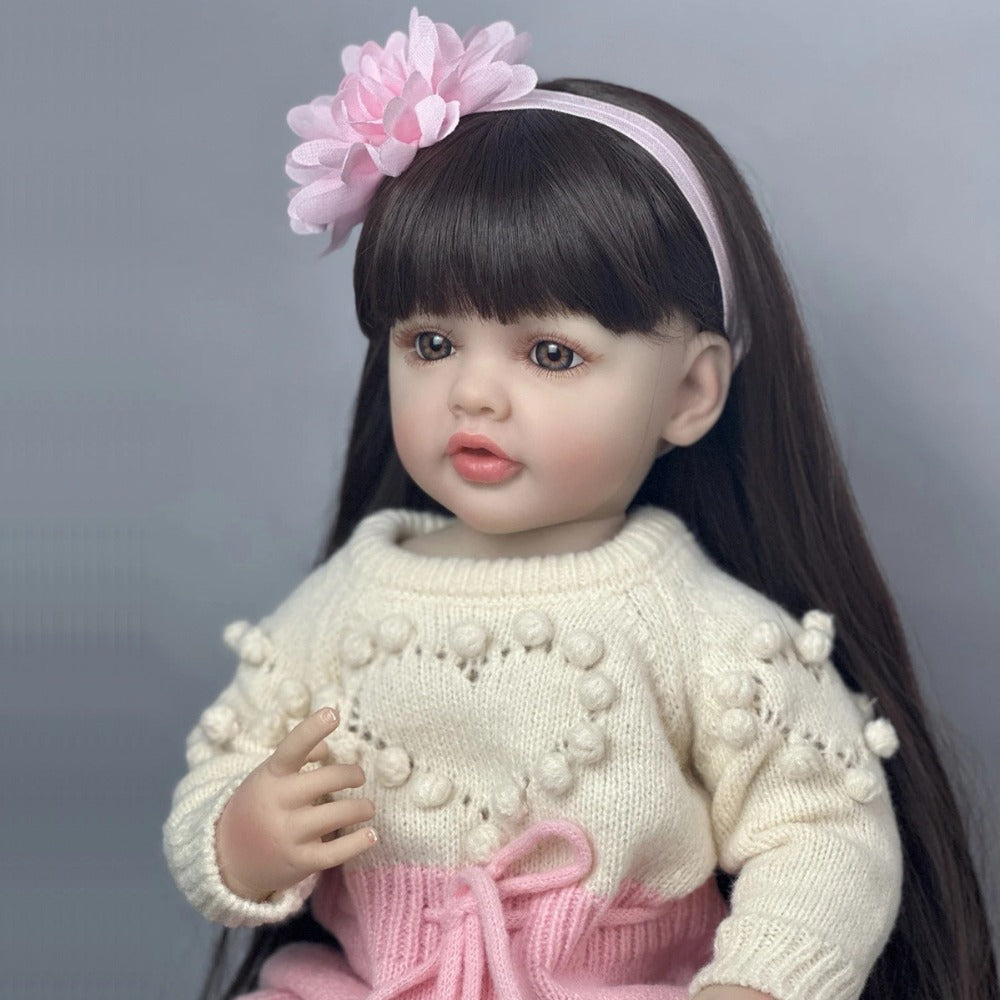 Reborn Baby Doll 22-Inch Full Vinyl Seated Design with Long Dark Wig Hair, Acrylic Eyes and Outfit Set — image 4