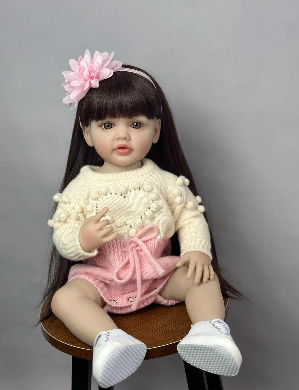 Reborn Baby Doll 22-Inch Full Vinyl Seated Design with Long Dark Wig Hair, Acrylic Eyes and Outfit Set — image 9