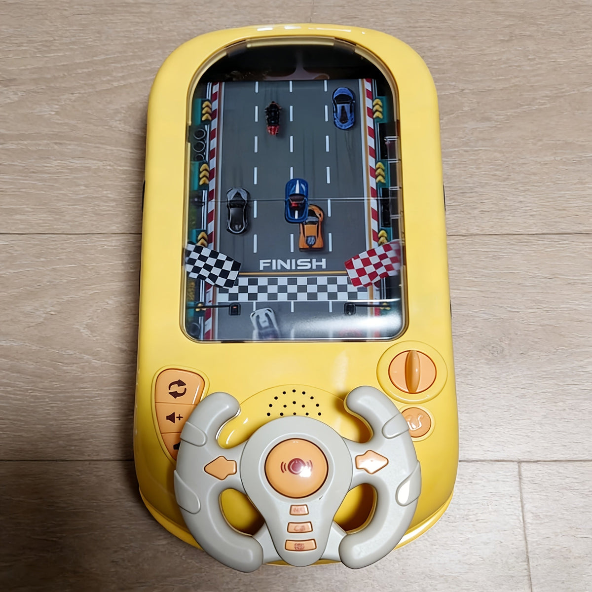 Electronic Racing Steering Wheel Game Toy with 200 Pictured Levels, Two Speeds and Yellow or Green Options — image 1
