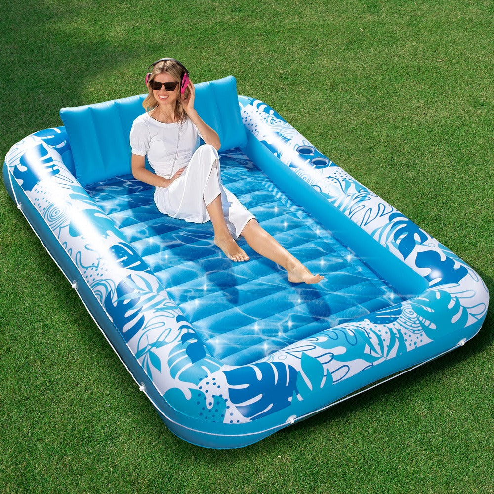 85 x 57-Inch Inflatable Pool Float Tanning Bed in Blue with Open Center, Ribbed Base and Raised Pillow — image 2