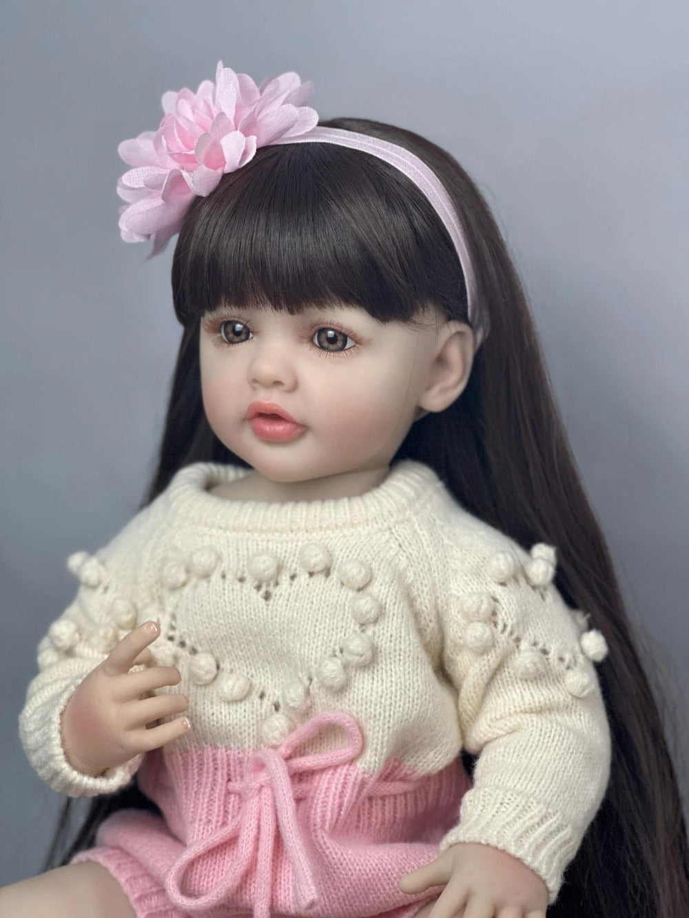 Reborn Baby Doll 22-Inch Full Vinyl Seated Design with Long Dark Wig Hair, Acrylic Eyes and Outfit Set — image 8