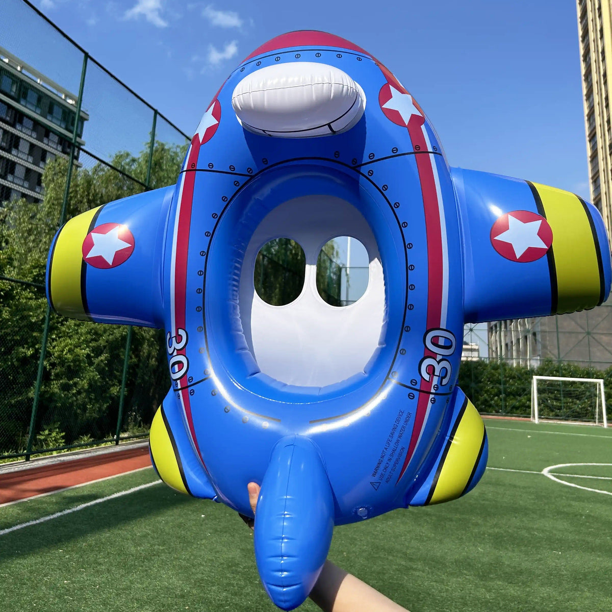Airplane-Shaped Inflatable Pool Float with Blue Printed Body, Center Opening, Wings, Tail and 33.46-Inch Length — image 1